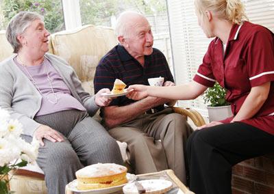 Image of seniors with home care workers